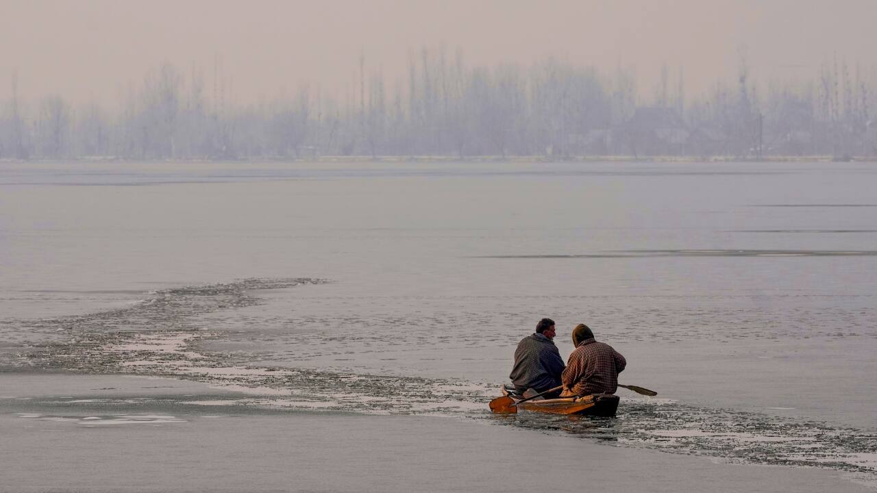 Dal Lake's serene beauty as it begins to freeze, capturing the essence of Kashmir's chill as temperatures dip (Image: PTI)