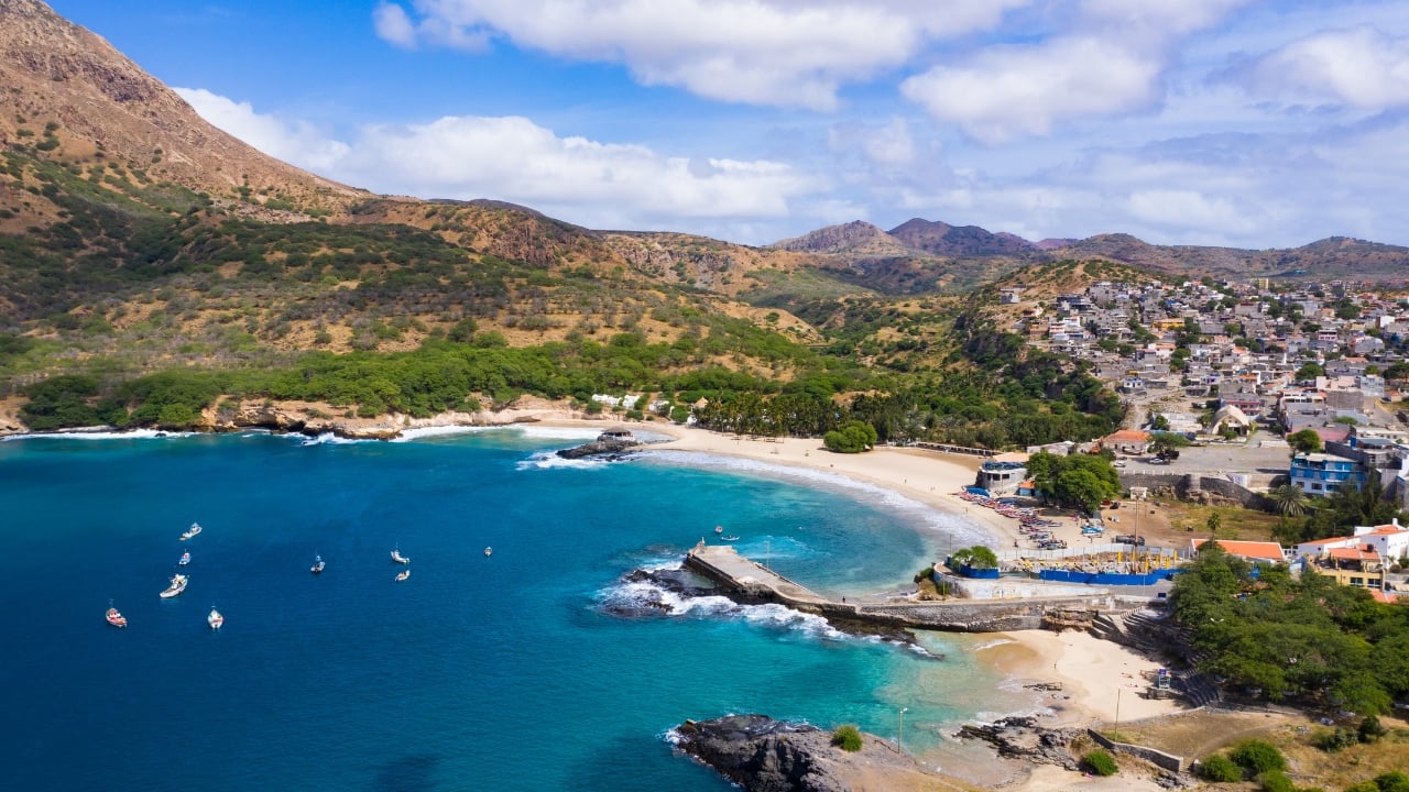 5. Cape Verde | For an off-the-beaten-path destination, Cape Verde offers an idyllic blend of sandy beaches and rich culture. With average January temperatures in the mid-20s°C, this African archipelago is ideal for those seeking a laid-back escape. Whether you’re sipping coconut water on Boa Vista’s white sands or exploring the volcanic landscapes, Cape Verde provides a unique winter sun experience. (Image: Canva) 5. Cape Verde | For an off-the-beaten-path destination, Cape Verde offers an idyllic blend of sandy beaches and rich culture. With average January temperatures in the mid-20s°C, this African archipelago is ideal for those seeking a laid-back escape. Whether you’re sipping coconut water on Boa Vista’s white sands or exploring the volcanic landscapes, Cape Verde provides a unique winter sun experience. (Image: Canva)