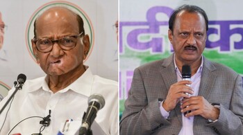 File: Sharad Pawar (L) and Ajit Pawar