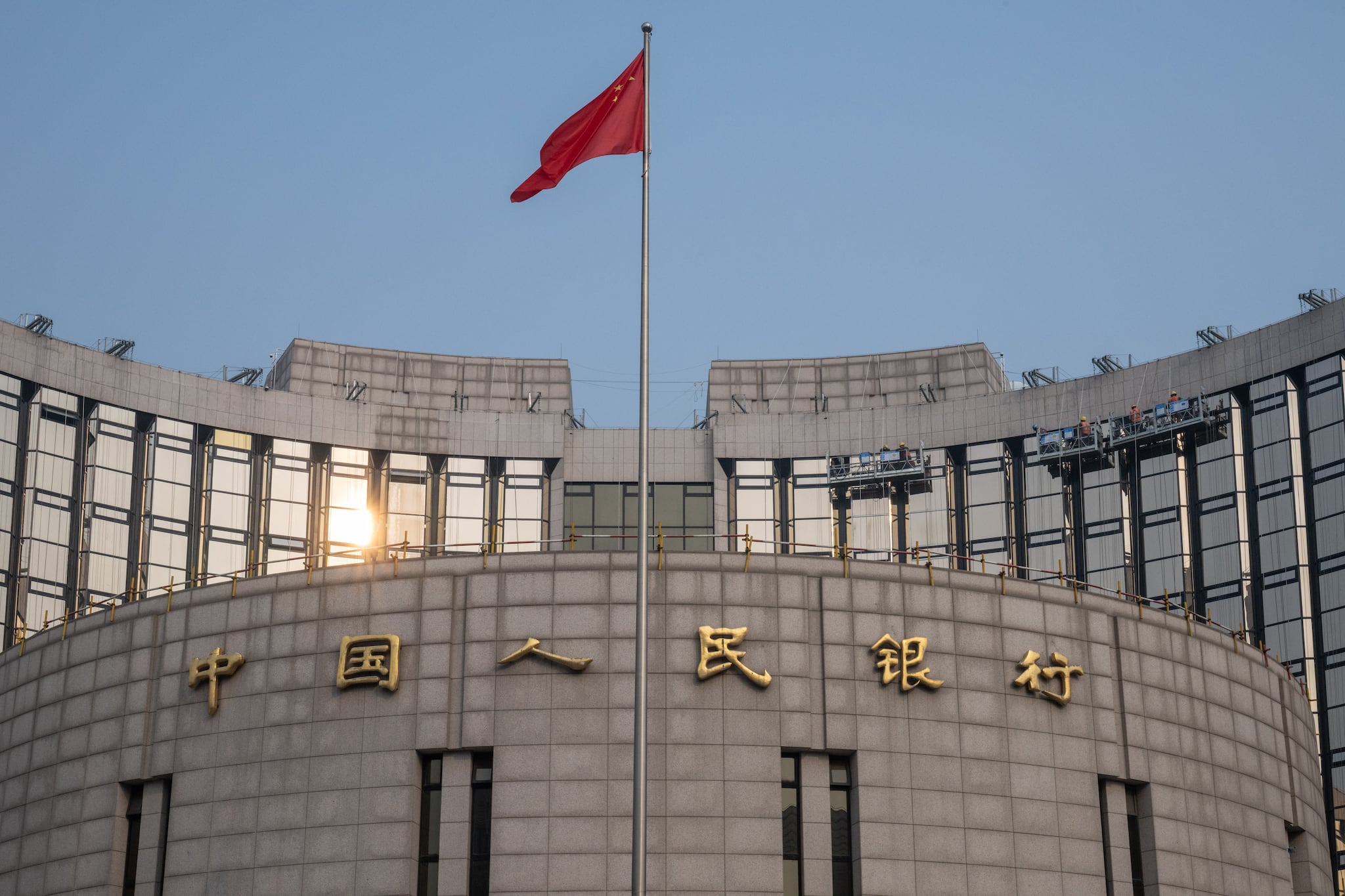 PBOC says it will temporarily halt buying of government bonds