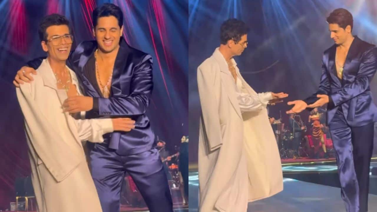 Sidharth Malhotra playfully removes Karan Johar’s blazer during the ramp walk, watch video