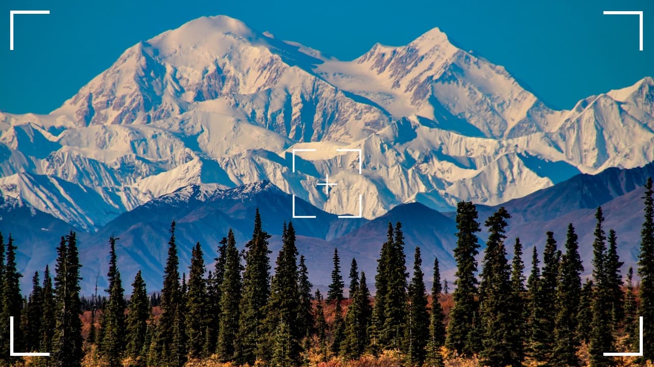 1. Denali National Park, Alaska, USA Home to North America’s tallest peak, Mount Denali, this park boasts breathtaking mountain vistas, glacial rivers, and abundant wildlife like moose, grizzly bears, and caribou. Denali's unspoiled wilderness is a dream for nature photographers. Photography tip: Use a wide-angle lens to capture the grandeur of Mount Denali and its surrounding landscapes. For wildlife, stay patient and use a telephoto lens to capture animals in their natural habitat against the park's majestic backdrops. (Image: Canva)