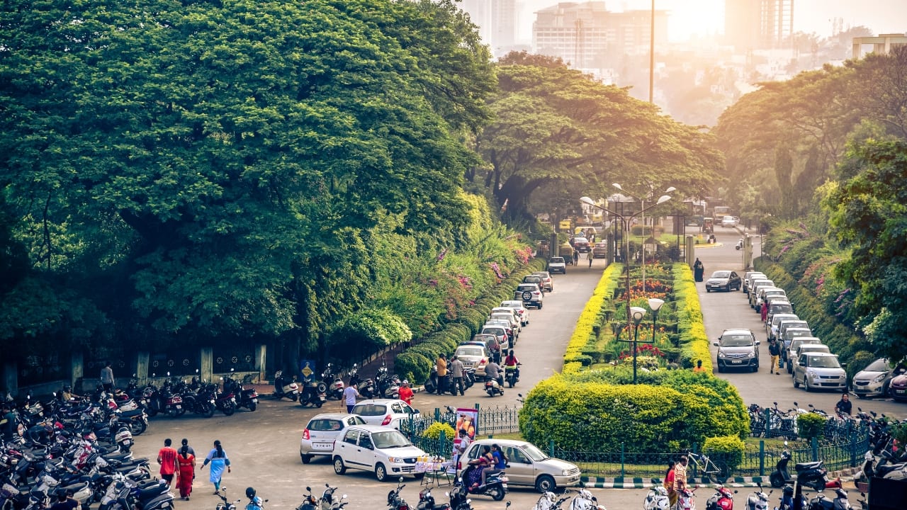 2. Bengaluru Average Travel Time Per 10 km: 34 minutes, 10 seconds India's tech hub, Bengaluru, is infamous for its traffic gridlocks. Rapid urbanization combined with limited road infrastructure has made commuting a significant challenge for its residents. (Image: Canva)