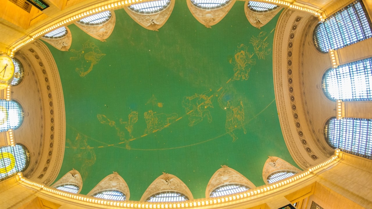 8. The Mirrored Sky Look up at Grand Central's celestial dome, and you’ll notice something peculiar: the stars are depicted in reverse order! This mirrored design was meant to symbolize the sky as it would have appeared in ancient times, offering an otherworldly beauty to the station’s architectural splendor. (Image: Canva)