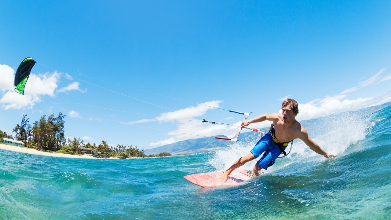 6. Try Kite Surfing at Le Morne For the adventurous couple, kite surfing at Le Morne is a thrilling experience. With its perfect wind conditions and clear, warm waters, it’s a fantastic way to add a little adrenaline to your honeymoon while enjoying the beautiful surroundings. (Image: Canva)