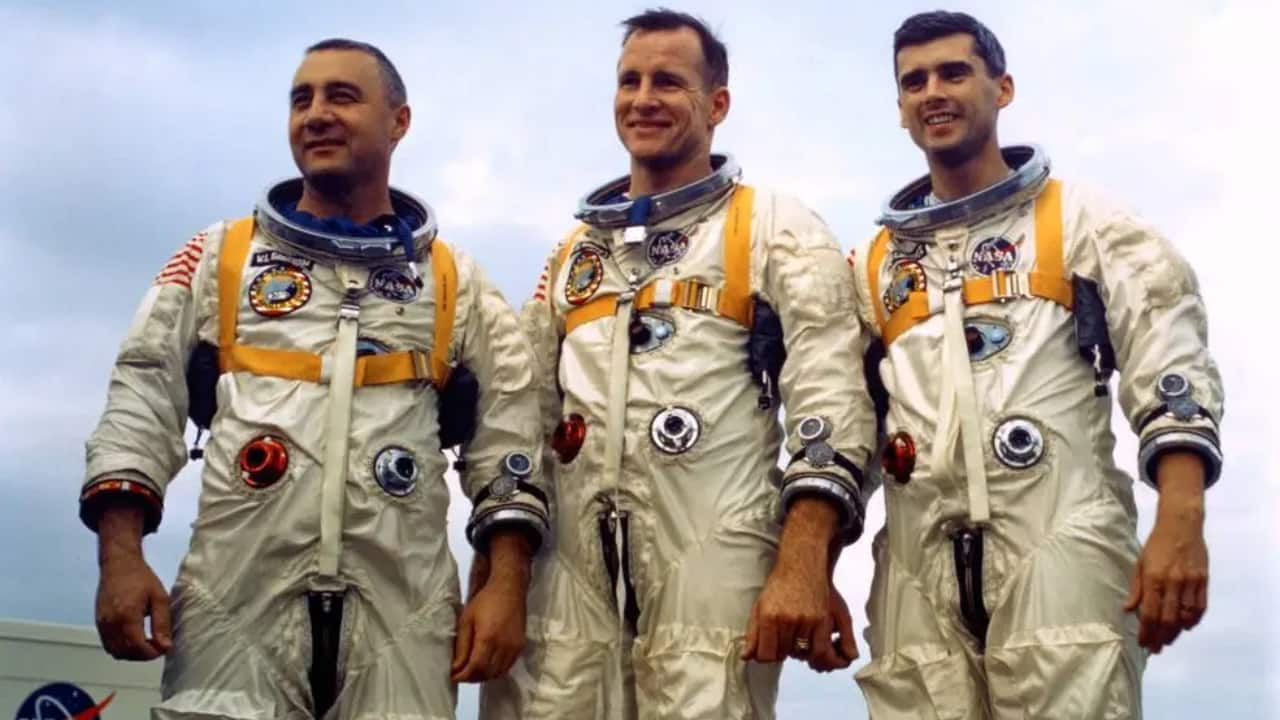 Apollo 1 astronauts Virgil I. “Gus” Grissom, left, Edward H. White, and Roger B. Chaffee pose for photographers during a media event at Launch Complex 34. (Image: NASA)