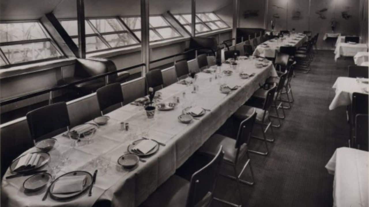 LUXURIOUS AMENITIES: The Hindenburg featured a dining room, lounge, observation deck, and a smoking room. Its dining area was exquisite, with fine linens and crystal, while the twin-berth cabins mirrored luxury train accommodations, offering passengers an upscale travel experience despite the hydrogen risk. (Image: airships.net)
