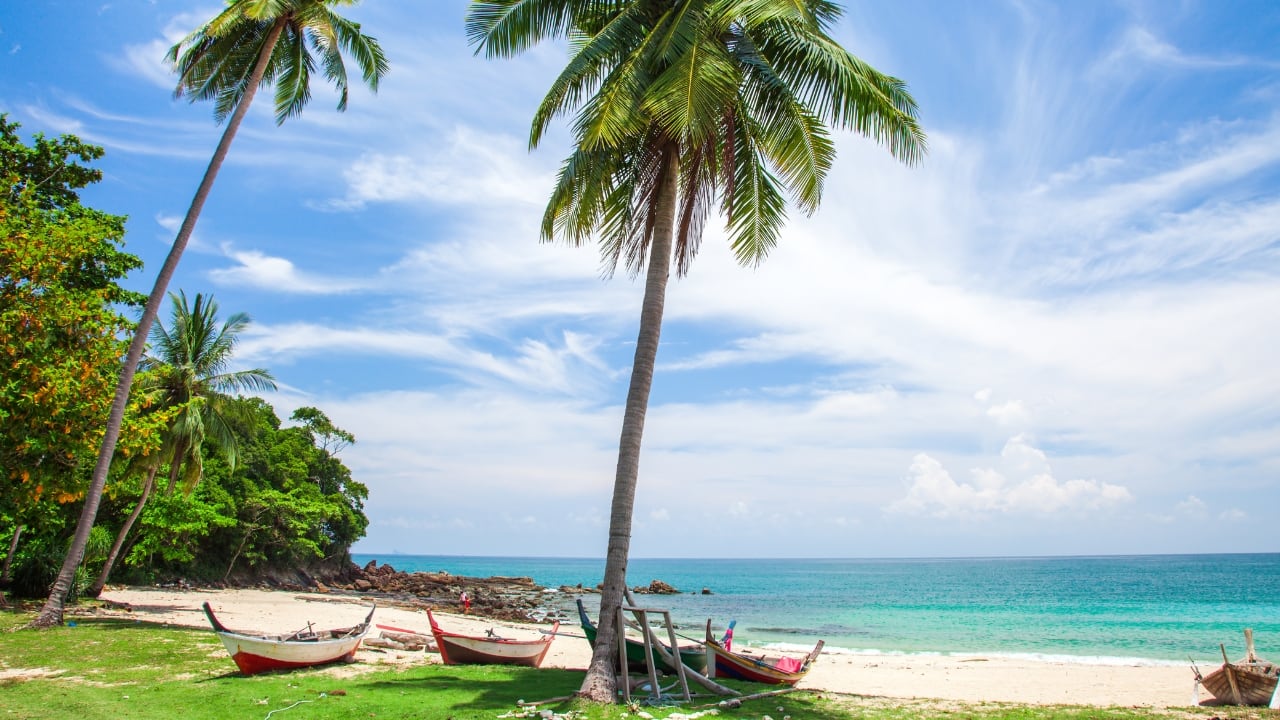 3. Koh Lanta If you’re craving a beach escape that’s far from the crowds, Koh Lanta is your answer. Known for its peaceful ambiance, pristine beaches, and lush jungles, this island offers the perfect balance of relaxation and adventure. Spend your days lounging by the sea, exploring local fishing villages, or hopping on a boat to nearby islands for snorkeling and diving. (Image: Canva)