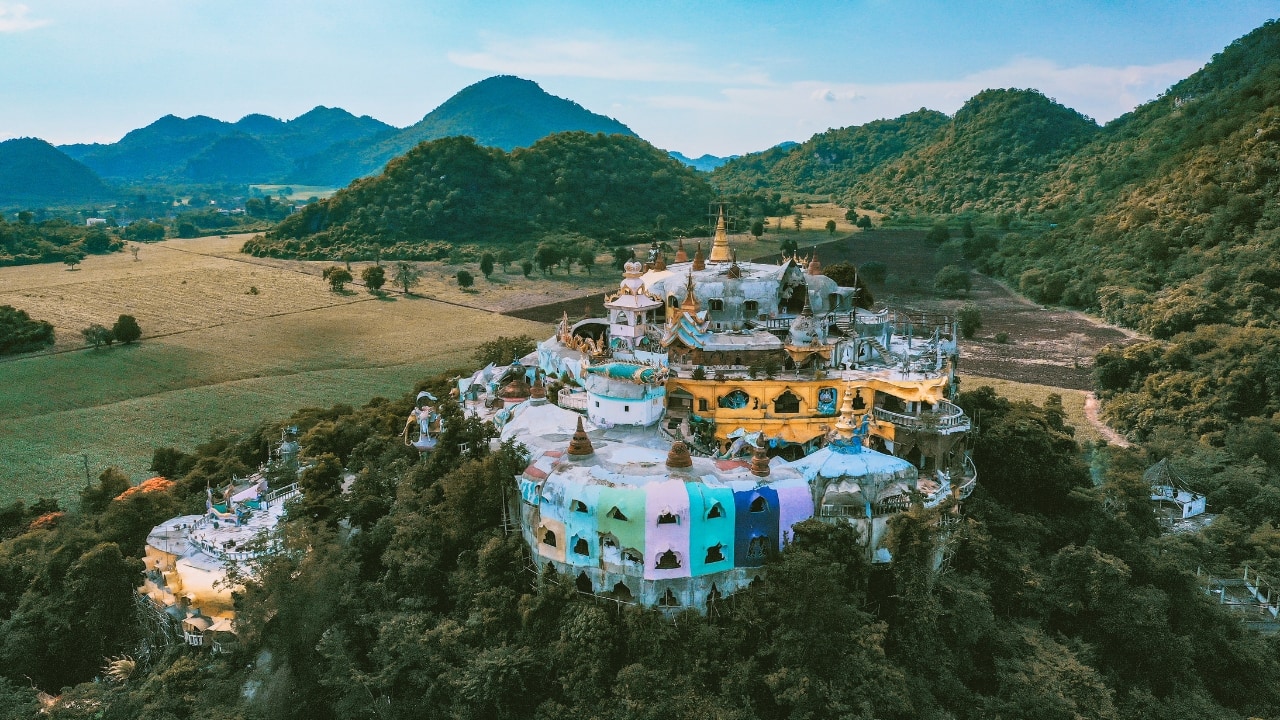 Thailand is often synonymous with bustling markets, vibrant nightlife, and idyllic beaches, but did you know that it’s also home to some truly magical, lesser-known destinations? If you're looking to break away from the crowds and discover Thailand’s hidden treasures in 2024, these ten under-the-radar spots are waiting to be explored. From pristine beaches to historical wonders, get ready for an unforgettable journey off the beaten path. (Image: Canva)