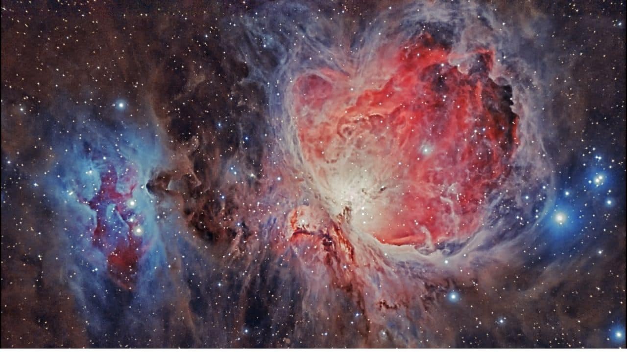 THE ORION NEBULA: A breathtaking stellar nursery, 1,344 light-years away, where new stars are born from swirling gas and dust, showcasing vibrant colors and dramatic textures. (Image: NASA)