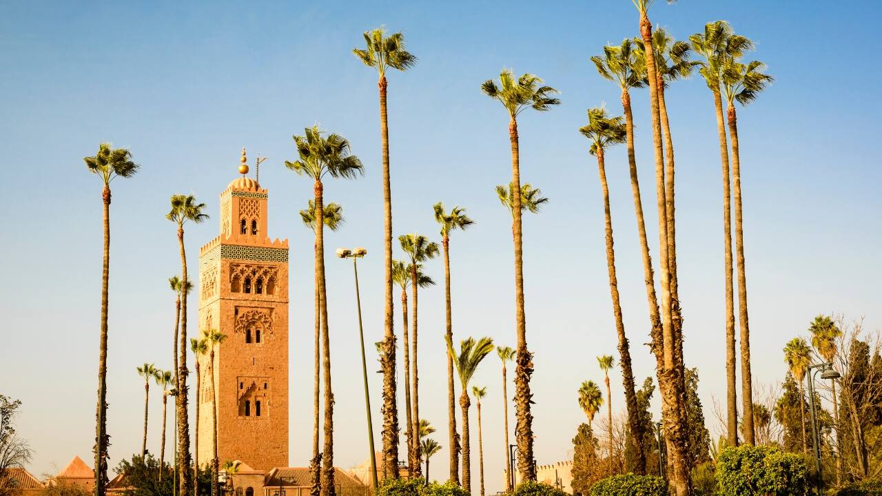 4. Marrakech, Morocco Known as the &quot;Red City,&quot; Marrakech pulses with life at every corner. Explore the bustling markets of the Medina, unwind in the tranquil Jardin Majorelle, or marvel at the architectural beauty of ancient mosques and palaces. Marrakech invites travelers to experience a sensory overload of color, sound, and culture—an essential stop for anyone seeking an authentic taste of Morocco. (Image: Canva)