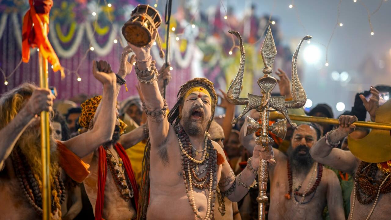 Devotees perform rituals at Maha Kumbh 2025, a global magnet for spiritual seekers. (Image: AP)
