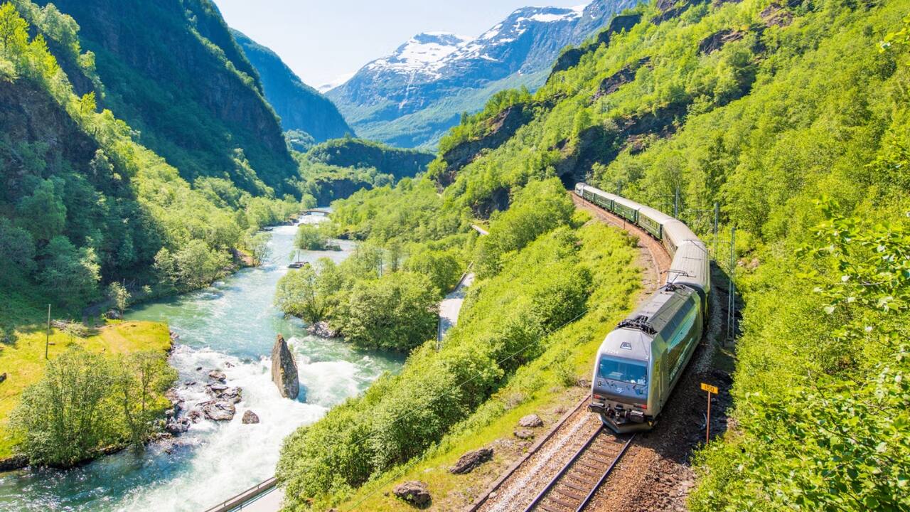 2. Myrdal to Flåm: The Flåm Railway, Norway Hop onto the Flåm Railway and feel like you’ve stepped into a fairy tale. This stunning route through Norway’s fjords takes you past roaring waterfalls, green valleys, and jagged cliffs, offering some of Europe’s most dramatic landscapes right from your seat.