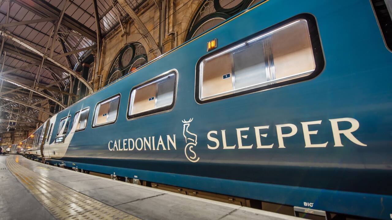8. London to Edinburgh: The Caledonian Sleeper, UK Transform an overnight journey into a cozy retreat aboard the Caledonian Sleeper, which takes you from London to Edinburgh in the comfort of a luxurious sleeper cabin. The scenery changes as you travel north, making this a restful yet visually striking experience. (Image: Caledonian Sleeper)