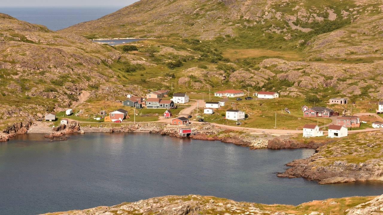 4. Fogo Island, Canada This remote island off the coast of Newfoundland is renowned for its raw, untamed beauty. With luxurious off-the-grid accommodations and an emphasis on local culture, Fogo Island is perfect for those seeking a quiet refuge. (Image: Canva