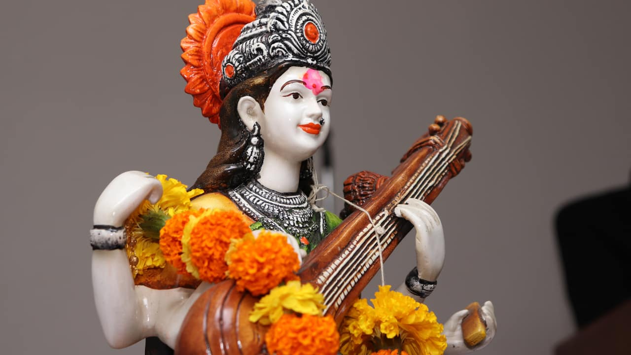 On Vasant Panchami, the color yellow represents the harmony between wisdom, learning, and nature. By wearing yellow and honoring Saraswati, we invite wisdom and success into our lives. (Image: Canva)
