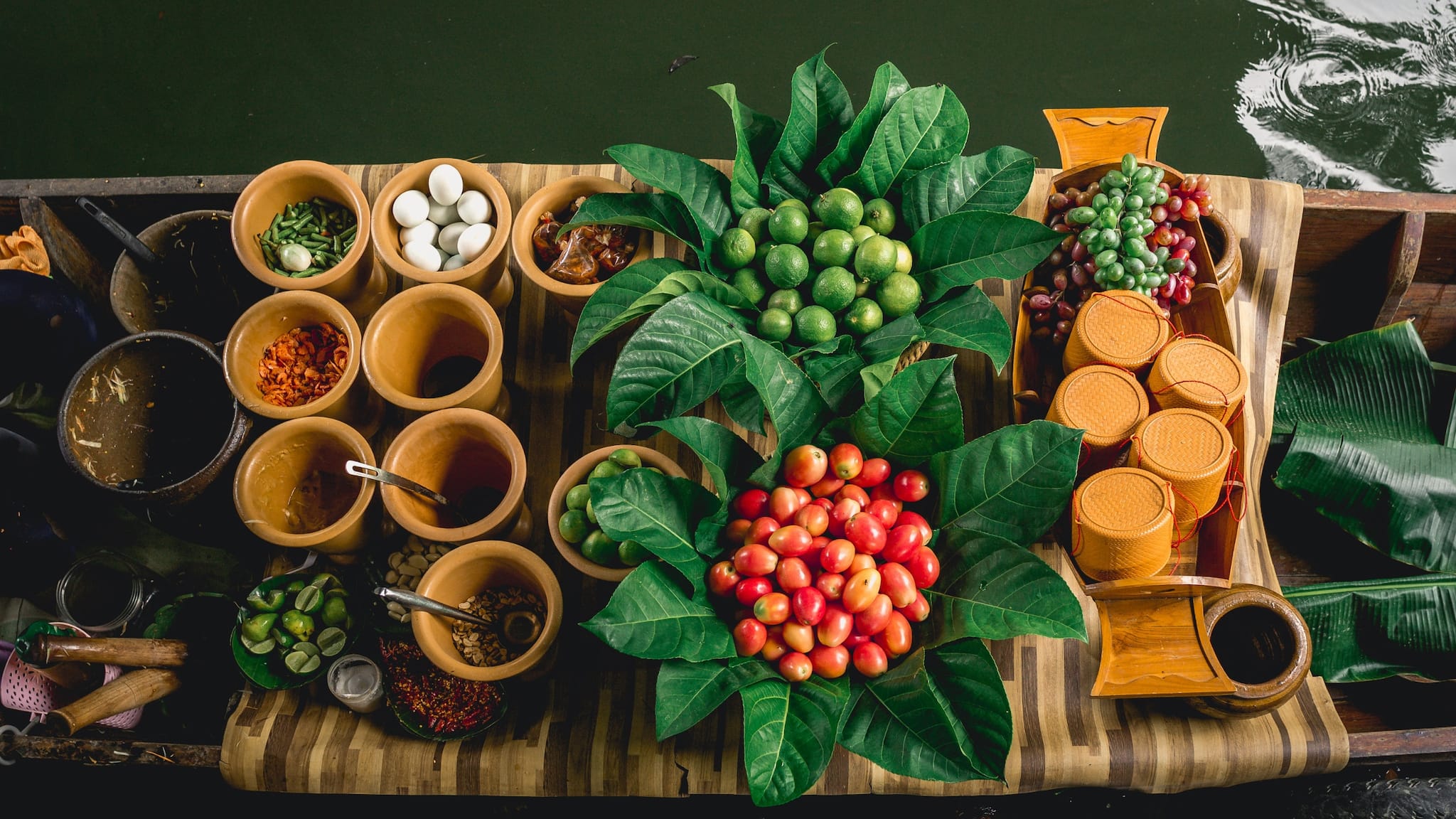 6. Taling Chan Floating Market, Thailand For an authentic, less-commercialized floating market, Taling Chan offers a peaceful escape. It’s a wonderful spot to enjoy boat noodles, fresh fruit, and meet locals selling handmade crafts, all while soaking in the charm of a traditional Thai market. Best Time to Visit: Weekends, when the market is in full swing. (Image: Canva)