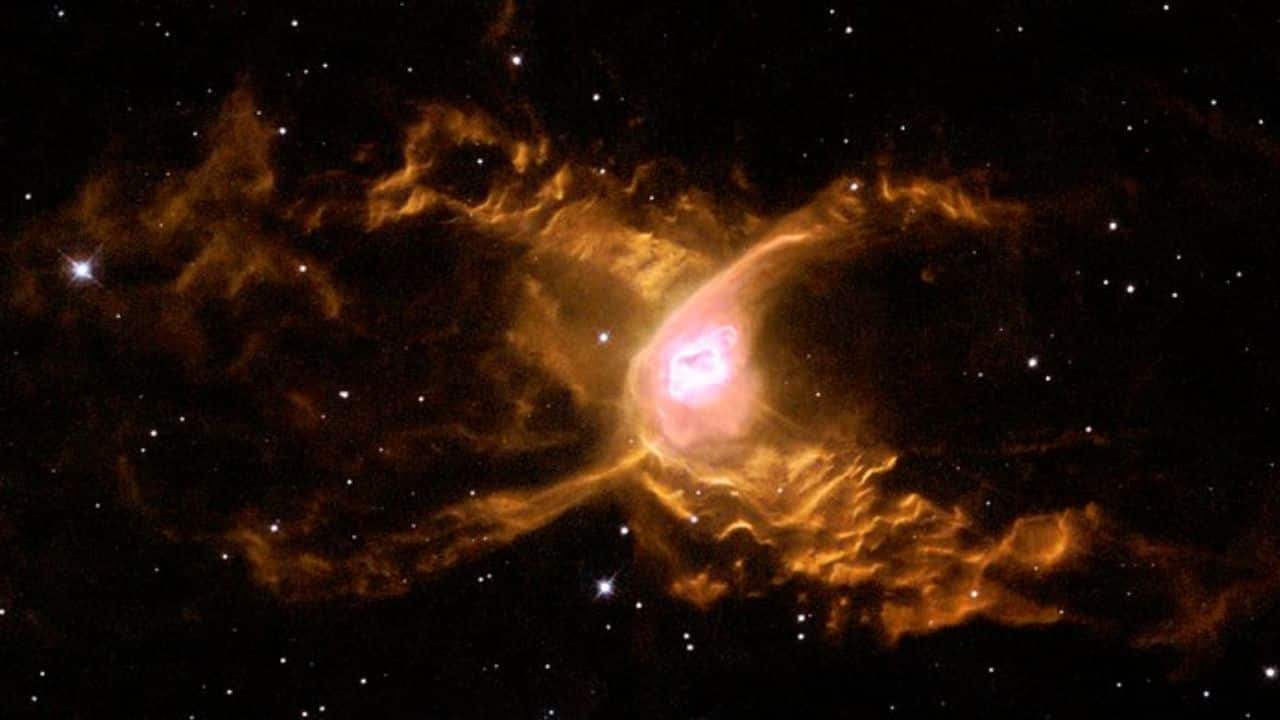 Spider Nebula: The Spider Nebula, or IC 417, is a dazzling star-forming region located 10,000 light-years away in the Auriga constellation. Its wispy tendrils of gas and dust resemble a cosmic spider’s web. NASA’s observations reveal young, hot stars illuminating the nebula, creating a glowing, web-like structure in deep space. (Image: NASA)