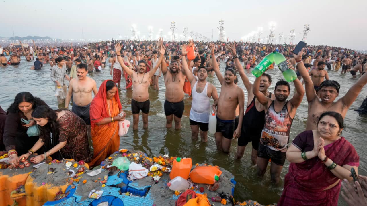 A bird’s-eye view captures thousands of devotees taking a holy dip at the Sangam on Maghi Purnima. The vast crowd reflects the unshakable faith of millions attending Maha Kumbh 2025. (Image: PTI)