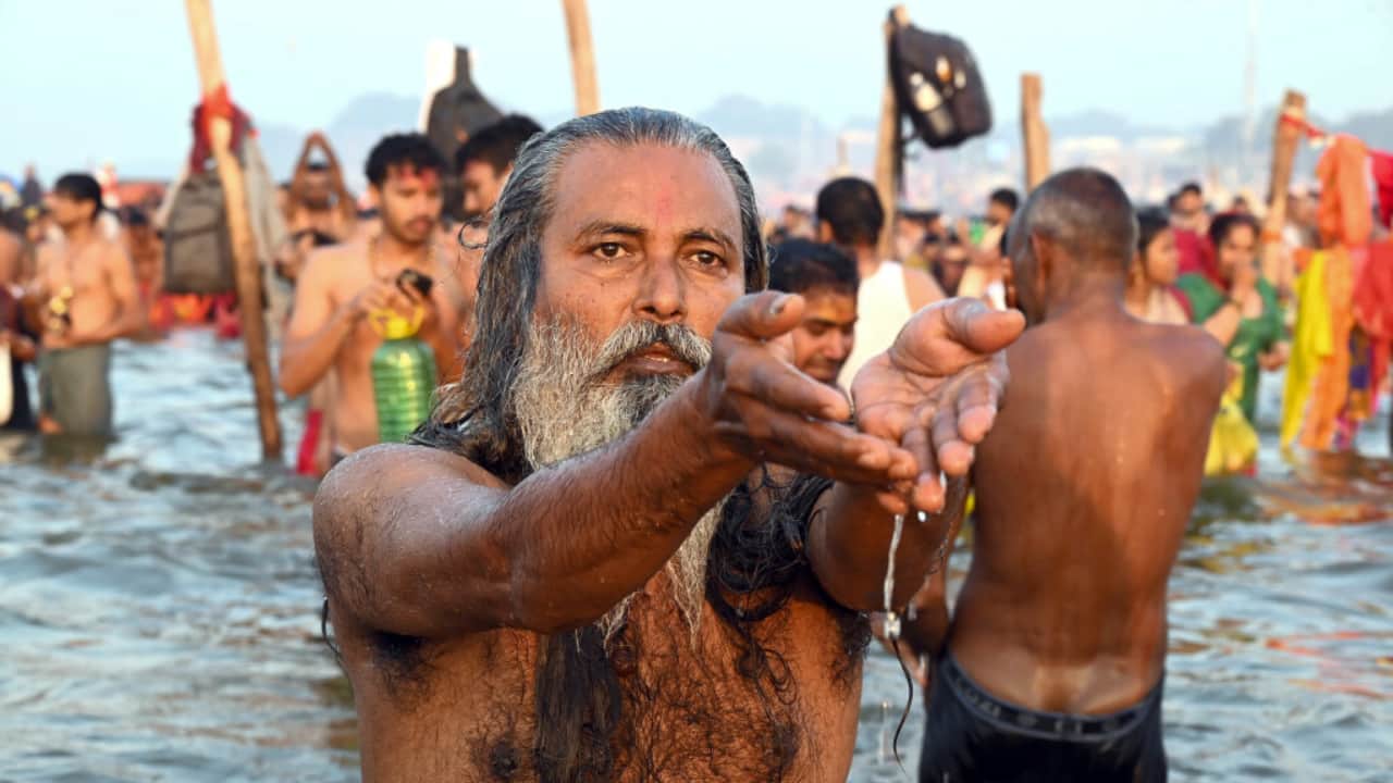 As the day progresses, devotees continue to take holy dips at the Sangam, chanting prayers and seeking blessings on the sacred occasion of Maghi Purnima during Maha Kumbh 2025. (Image: PTI)