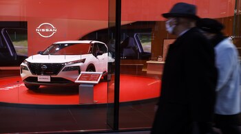 A Nissan Motor Co. X-Trail vehicle displayed inside the company's Ginza showroom in Tokyo, Japan, on Wednesday, Dec. 18, 2024. Nissan Motor Co. is in talks with fellow Japanese carmaker Honda Motor Co. to merge, in a deal that would help the ailing company survive, while also creating the world's third-largest automaker with a better chance of withstanding the industry's ructions. Photographer: Kiyoshi Ota/Bloomberg
