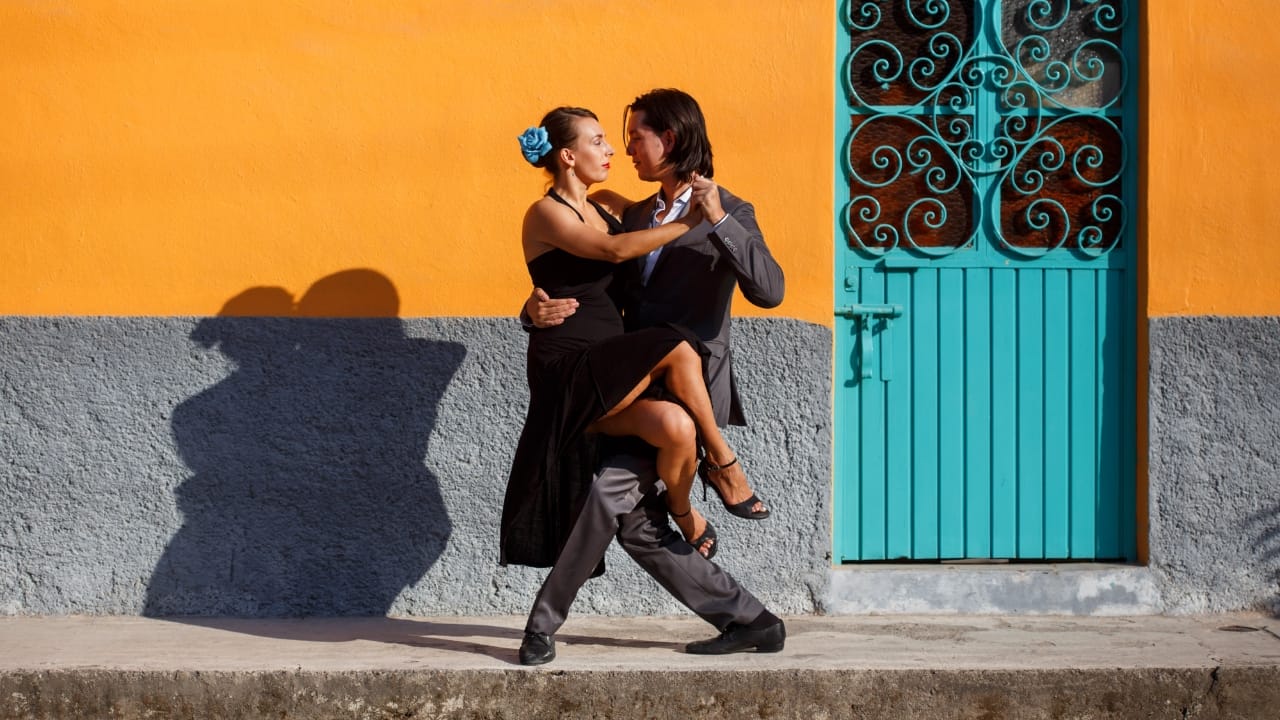 7. Dance the Tango in Argentina Few things are as passionate as an Argentine tango, and Buenos Aires is the perfect place to learn! Whether you’ve got two left feet or some serious dance moves, a tango class will have you swaying, spinning, and laughing together. After the lesson, step into a real tango club, sip some Malbec, and dance the night away like true locals. (Image: Canva)