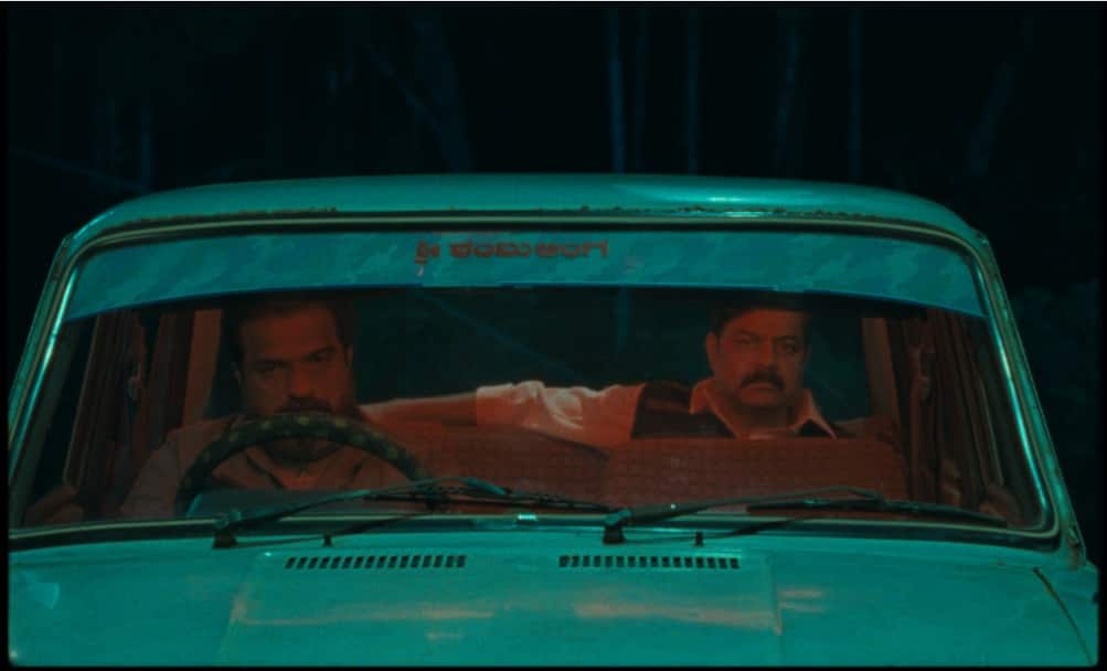 Malayalam actor Dileesh Pothan (left) and Kannada actor Achyuth Kumar in a still from Vagachipani.