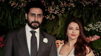 Abhishek Bachchan and Aishwarya Rai Bachchan, who have been married for over a decade, continue to silence divorce rumors with their strong bond. A resurfaced video shows Aishwarya lovingly praising Abhishek, calling him "handsome with brains."