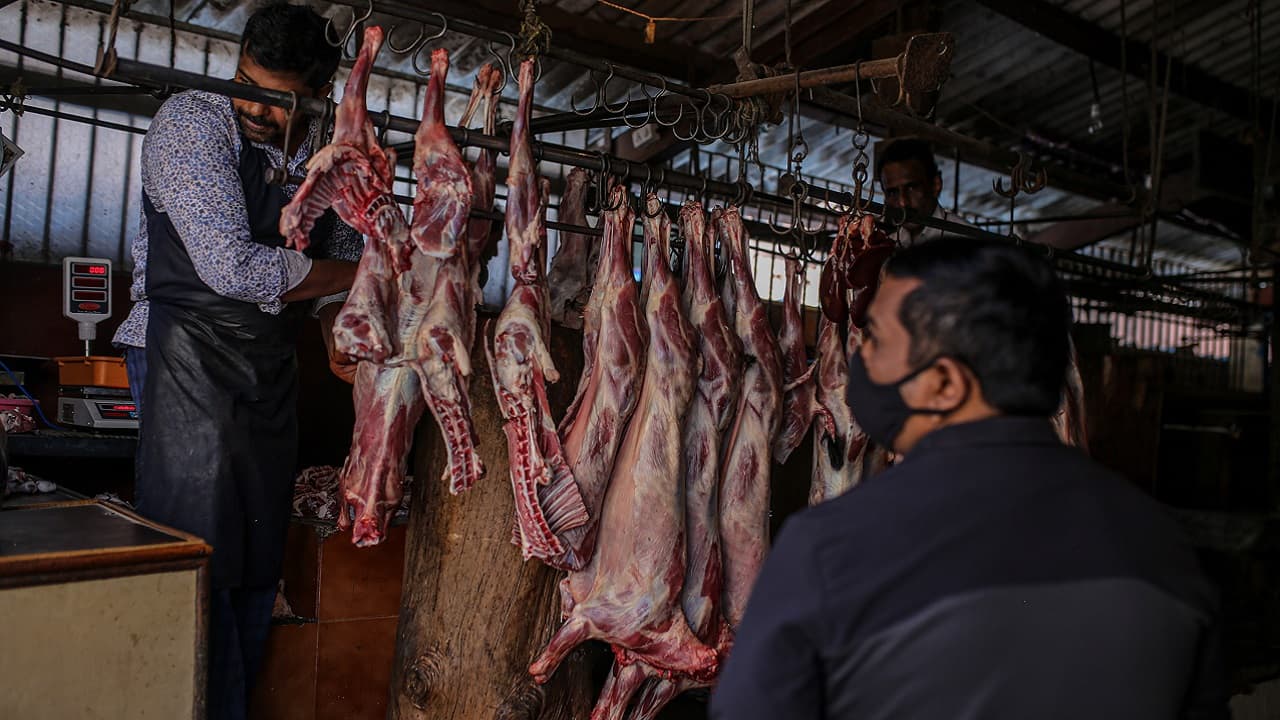 File photo of a vendor selling sheep meat at the Russell Market in Bengaluru, India. Bloomberg