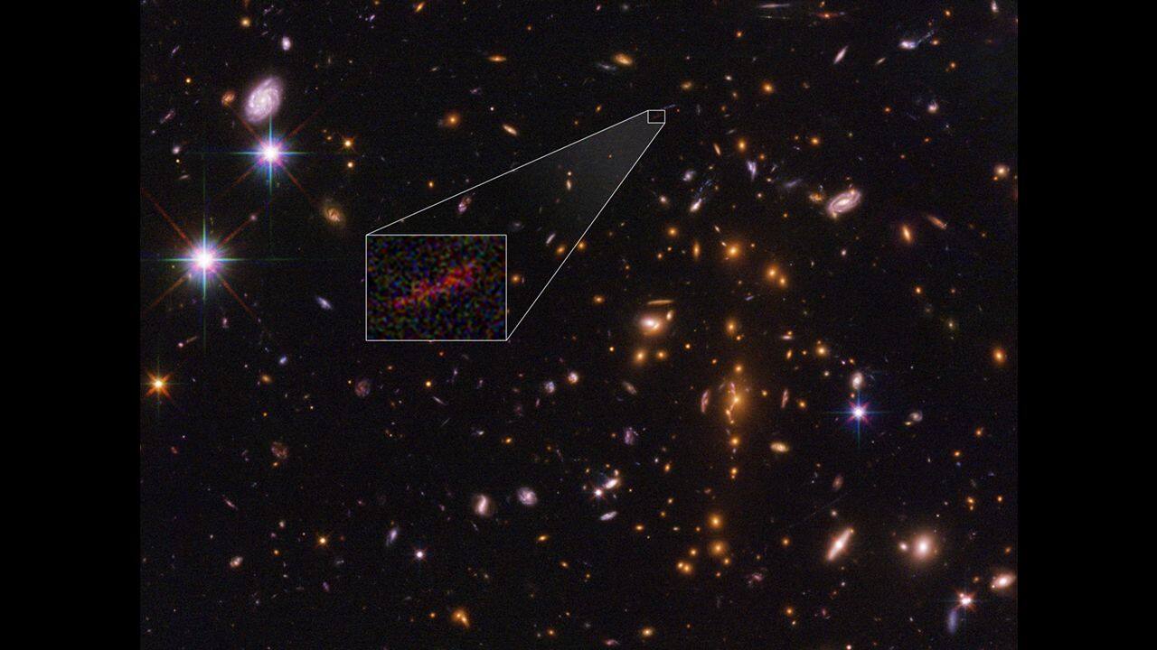 SPT0615-57 (12.8 Billion-Year-Old): Located 12.8 billion light-years away, SPT0615-57 is one of the most distant galaxies observed, with a redshift of z=4.76. It is approximately 1/10th the size of the Milky Way and has an estimated mass of around 10% of the Milky Way's mass. (Image: NASA/ESO)