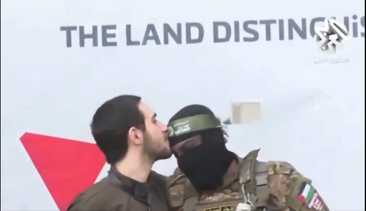Watch: Freed Israeli hostage kisses forehead of two Hamas members on stage
