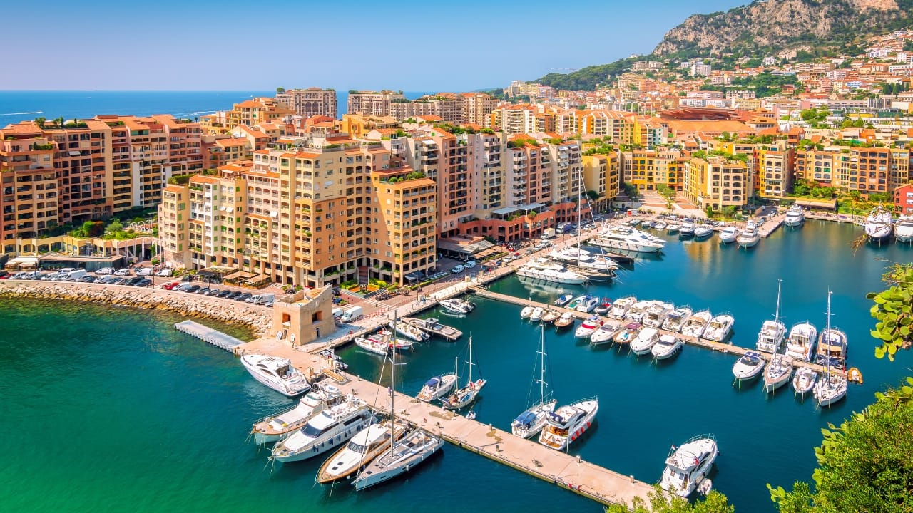 2. Monaco – Glitz, Glam, and a Seaside Stroll (2.08 sq km / 0.80 sq mi) This luxurious city-state on the French Riviera is pedestrian-friendly despite its high-rolling reputation. Walk from the Monte Carlo Casino to the Prince’s Palace, wander through the lush Japanese Gardens, and soak in the Mediterranean views from Larvotto Beach—all in half a day! (Image: Canva)
