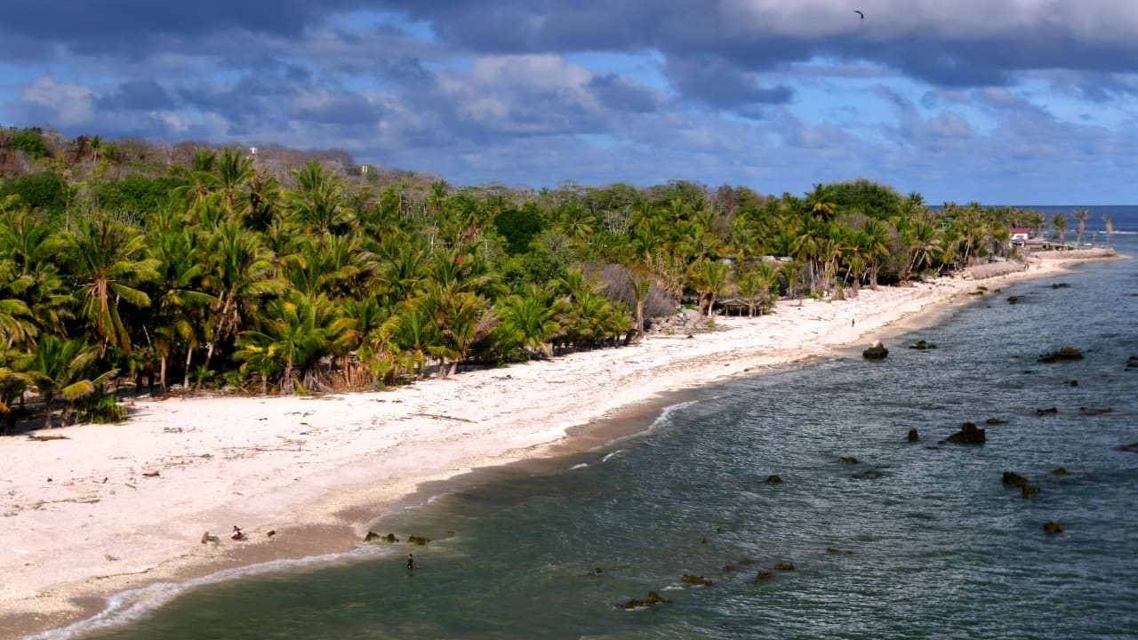 3. Nauru – The Island You Can Walk Around (21 sq km / 8.1 sq mi) One of the least-visited countries in the world, Nauru is small enough to circle entirely on foot in just 5–6 hours. Walk along its coast, climb Command Ridge for panoramic views, and explore the haunting remains of its phosphate-mining past. (Image: Canva)