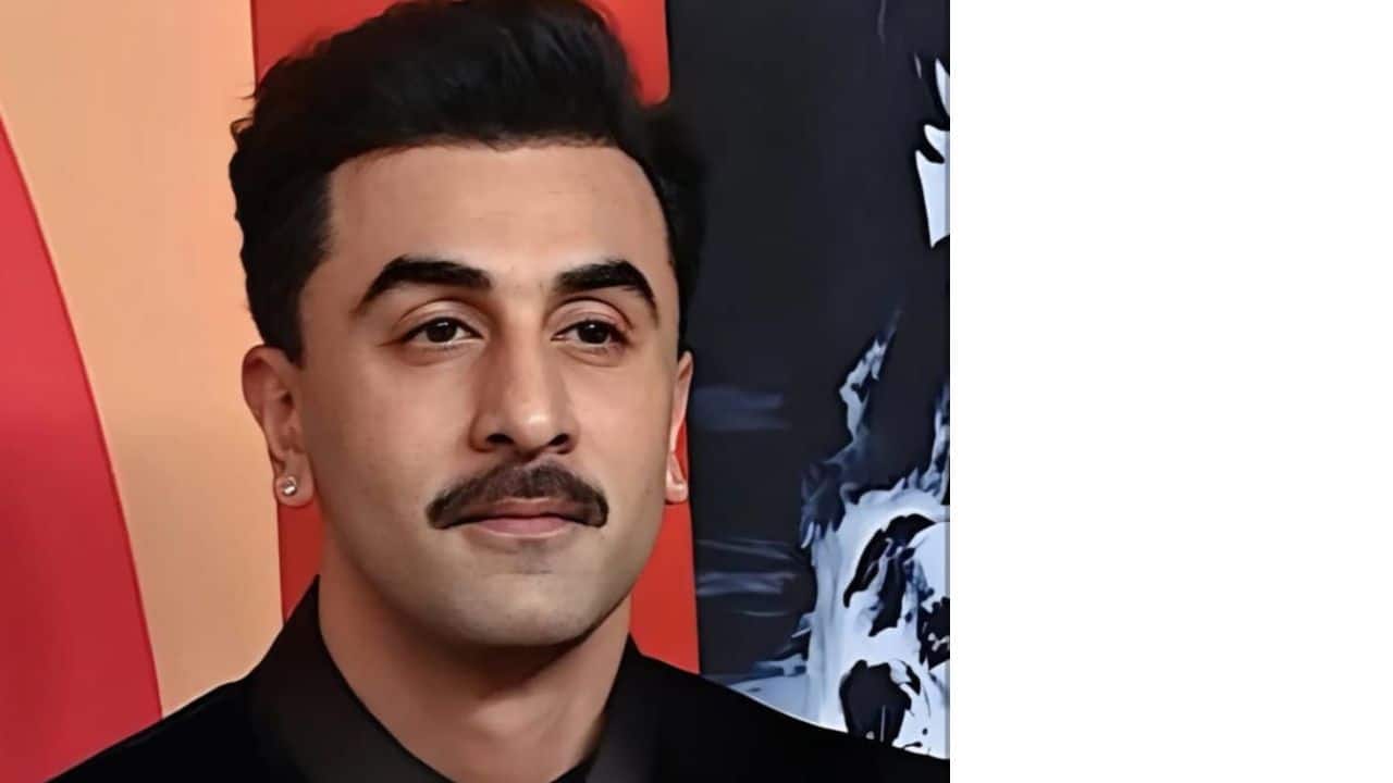 Ranbir Kapoor has always been a trendsetter when it comes to his looks. While he has sported heavy beards in films like Animal and Sanju, his latest moustache and light beard look is something fresh. Whether on set or in public appearances, Ranbir’s current moustache look has been making waves, showcasing a different side of his style. The look adds a vintage charm to his persona, making fans eager to see how he will utilize it in his upcoming roles.