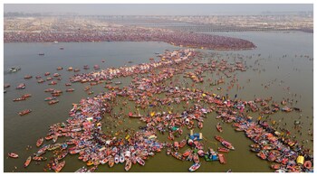 An aerial view of devotees taking a holy dip at Sangam on the occasion of Maha Shivratri during the Maha Kumbh in Prayagraj on Wednesday. (Courtesy: PTI photo)