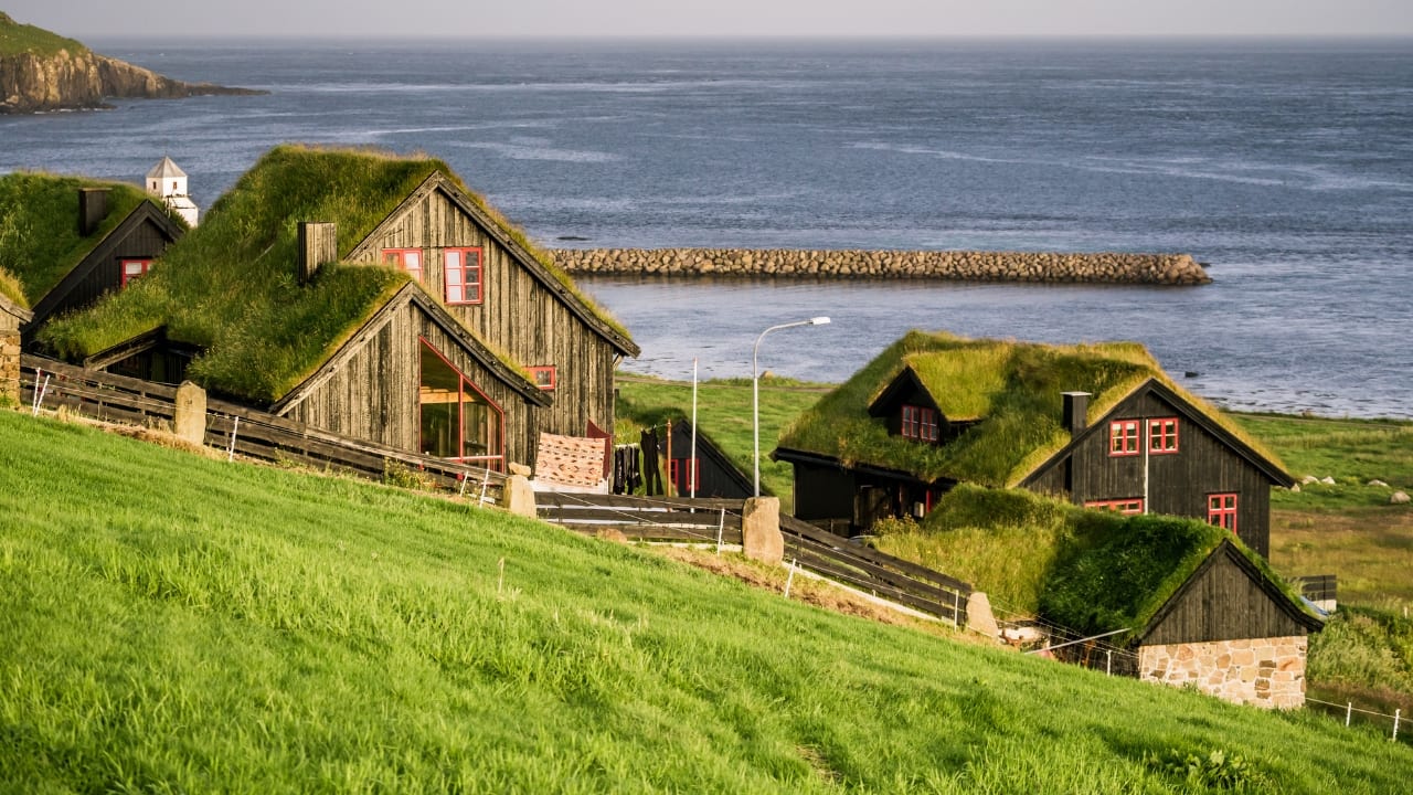 9. Discover the Faroe Islands and Skip Iceland's Tourist Spots. Although Iceland's unearthly scenery is well-known, they also attract large numbers of people. Think about the Faroe Islands for a similarly breathtaking but more subdued vacation. Dramatic cliffs, rich valleys, and tumbling waterfalls abound in this far-off archipelago. Couples who wish to reconnect with nature will find the ideal location free of the crowds. Discover hidden treasures few visitors ever get to see by touring charming towns. (Image: Canva)