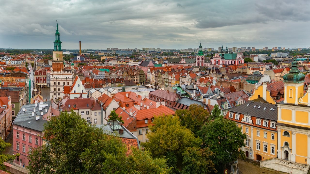 9. Poznań, Poland – A Riot of Color and Culture From the playful goat clock show at the Old Town Hall to vibrant street art and quirky cafés, Poznań is a cultural hub waiting to be explored. Vlog about its food scene, music festivals, and stunning Renaissance architecture. (Image: Canva)