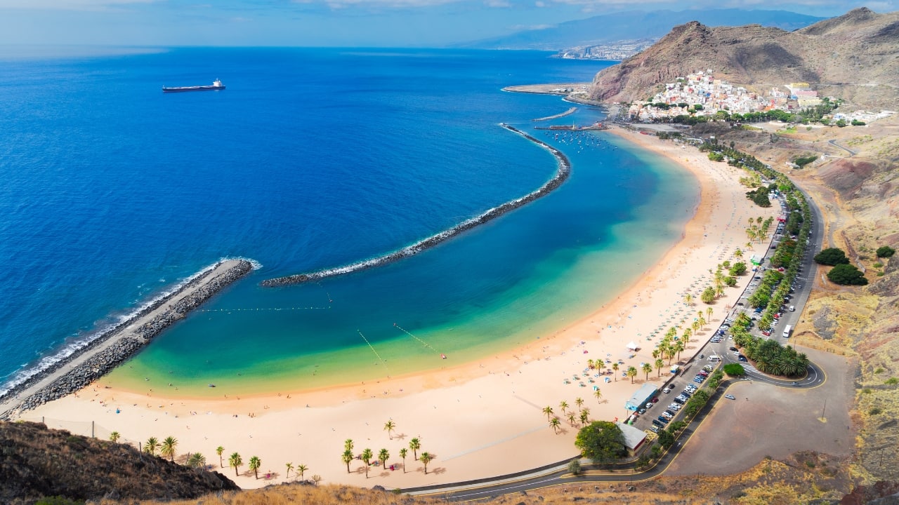 5. Tenerife, Spain – A Sunny Canary Islands Escape With year-round mild temperatures (22°C/72°F), Tenerife is an ideal March destination. Relax on black sand beaches, hike Mount Teide, or explore the lush forests of Anaga Rural Park. The Carnival of Santa Cruz, one of the world's largest celebrations, also takes place in early March. (Image: Canva)