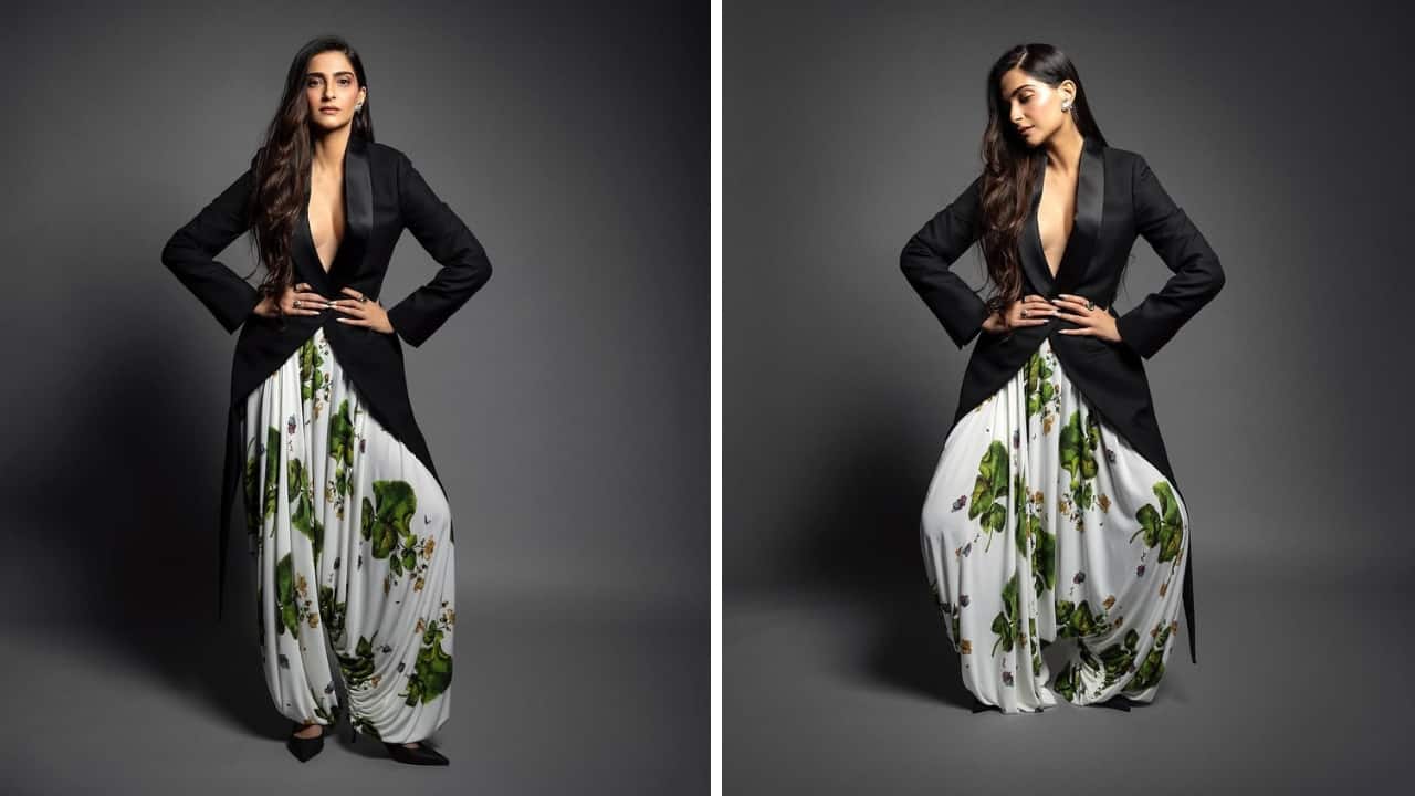 Sonam Kapoor contrasted her tailcot with a pair of white harem-style pants adorned with intricate leaf and butterfly motifs, delivering strong designer Patiala shalwar vibes (Images: @rheakapoor a/Instagram)