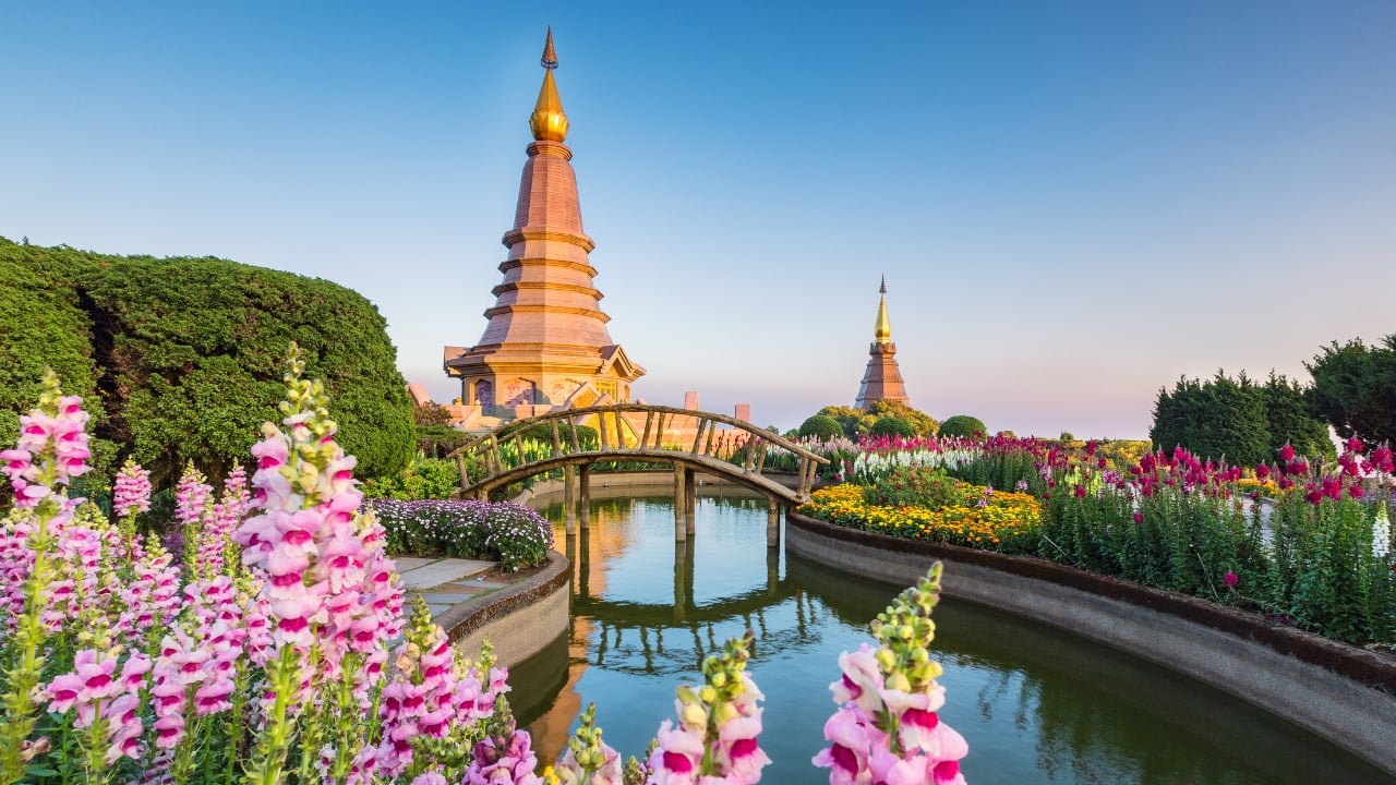 4. Thailand – A Mix of Adventure and Relaxation Visa Policy: Visa-free for up to 60 days Thailand is an all-time favorite for Indian travelers, offering everything from Bangkok’s lively streets to Phuket’s stunning beaches. Island-hop in Krabi, explore Chiang Mai’s temples, or dive into the floating markets of Pattaya. Budget Breakdown: Flights: Rs 15,000–Rs 20,000 Stay: Hostels Rs 1,200 per night Food &amp; Transport: Rs 2,500–Rs 3,000 per day Travel Tip: Take overnight buses instead of domestic flights to explore different cities affordably. (Image: Canva)