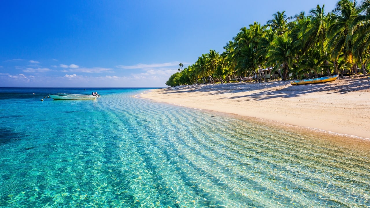 8. Fiji – A South Pacific Escape Visa Policy: Visa-free for up to 120 days Fiji offers stunning coral reefs, island-hopping adventures, and warm hospitality. Snorkel with manta rays, explore traditional villages, or just relax on the beaches of Yasawa Islands. Budget Breakdown: Flights: Rs 40,000 Stay: Dorm stays Rs 1,500 per night Daily expenses: Rs 2,500 Travel Tip: Stay on lesser-known islands for cheaper stays and more local experiences. (Image: Canva)