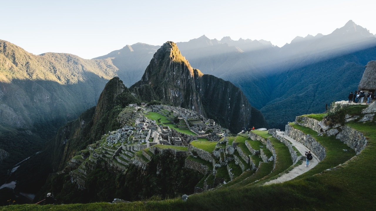 6. Peru – The Andes and Ancient Wonders The Andes Mountains dominate Peru, offering a mix of ancient ruins, deep canyons, and some of the best hiking trails in the world. Whether you’re standing in the shadow of Huascarán (6,768m) or trekking to Machu Picchu, Peru’s mountains are unforgettable. Where to Go: Machu Picchu &amp; the Inca Trail: The ultimate mountain journey. Huascarán National Park: Home to Peru’s highest peak. Rainbow Mountain: A surreal, multicolored mountain wonder. (Image: Canva)