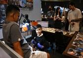Nine-year-old Thai tattooist says he learned the art from TikTok
