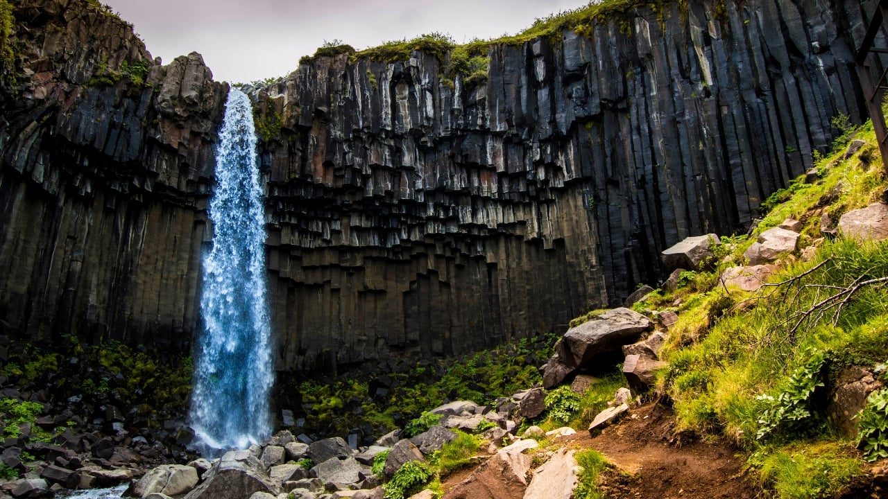 4. Vatnajökull National Park, Iceland – A Land of Fire and Ice Iceland is like another planet, and Vatnajökull is its most surreal landscape. Walk on ancient glaciers, explore ice caves that glow an eerie blue, and stand in awe of massive waterfalls crashing down volcanic cliffs. One of the highlights? The Jökulsárlón Glacier Lagoon, where icebergs float peacefully out to sea. It’s a place that reminds you just how powerful nature truly is. (Image: Canva)
