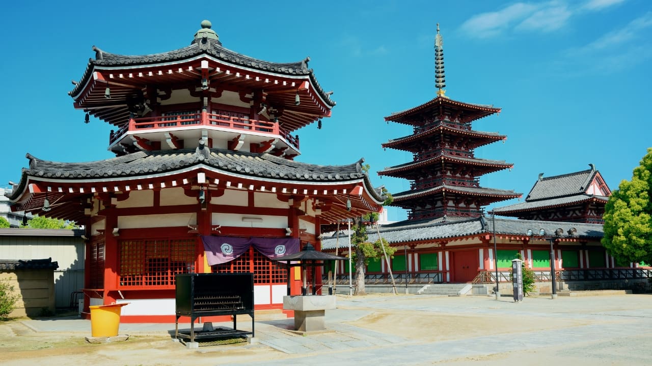 6. Find Peace at Shitenno-ji Temple Need a break from the city buzz? Visit Shitenno-ji, Japan’s oldest Buddhist temple, dating back to 593 AD. Stroll through its serene pagodas and peaceful gardens—it’s the perfect spot to reflect and recharge. (Image: Canva)