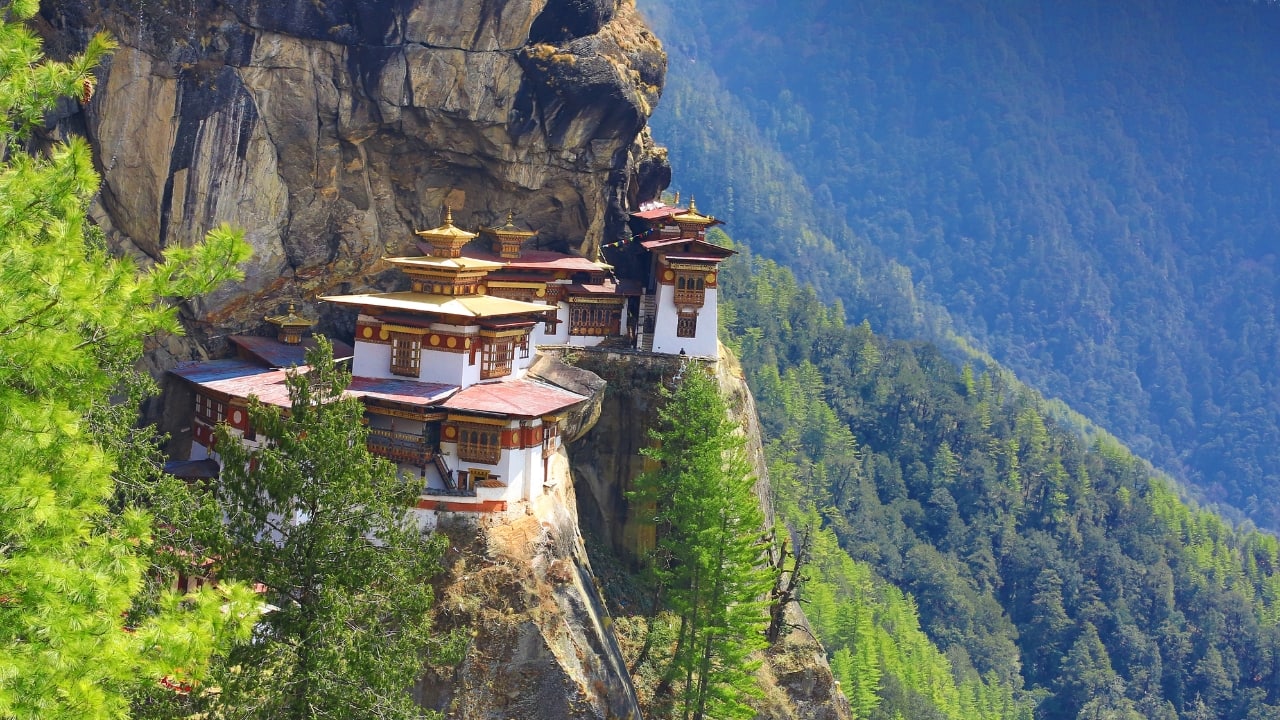 7. Bhutan – Nature and Culture in the Land of Happiness Bhutan’s serene landscapes and warm culture make it perfect for family bonding. Hike to the Tiger’s Nest Monastery or explore Thimphu’s colorful markets. Visa: No visa required for Indian citizens; an entry permit is provided. Budget Tip: Indian passport holders enjoy lower tourism tariffs, making Bhutan more affordable. (Image: Canva)