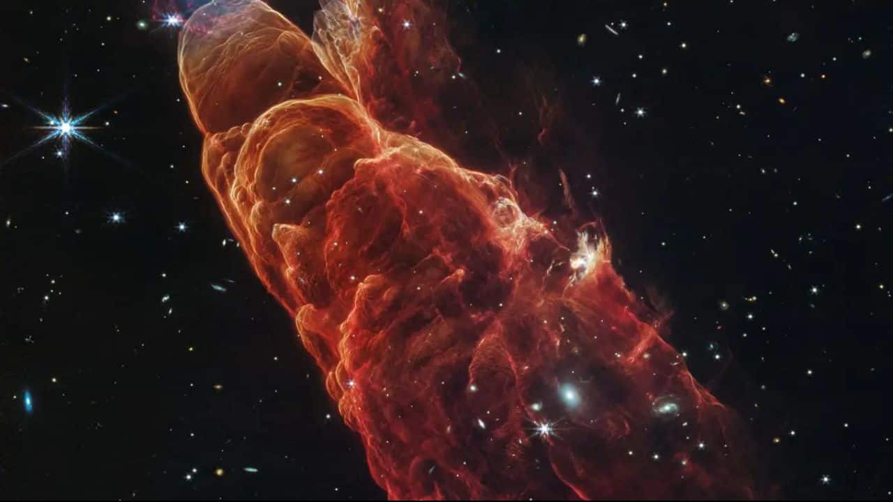 James Webb captures mesmerising swirls of a ‘cosmic tornado’ and a hidden galaxy in space