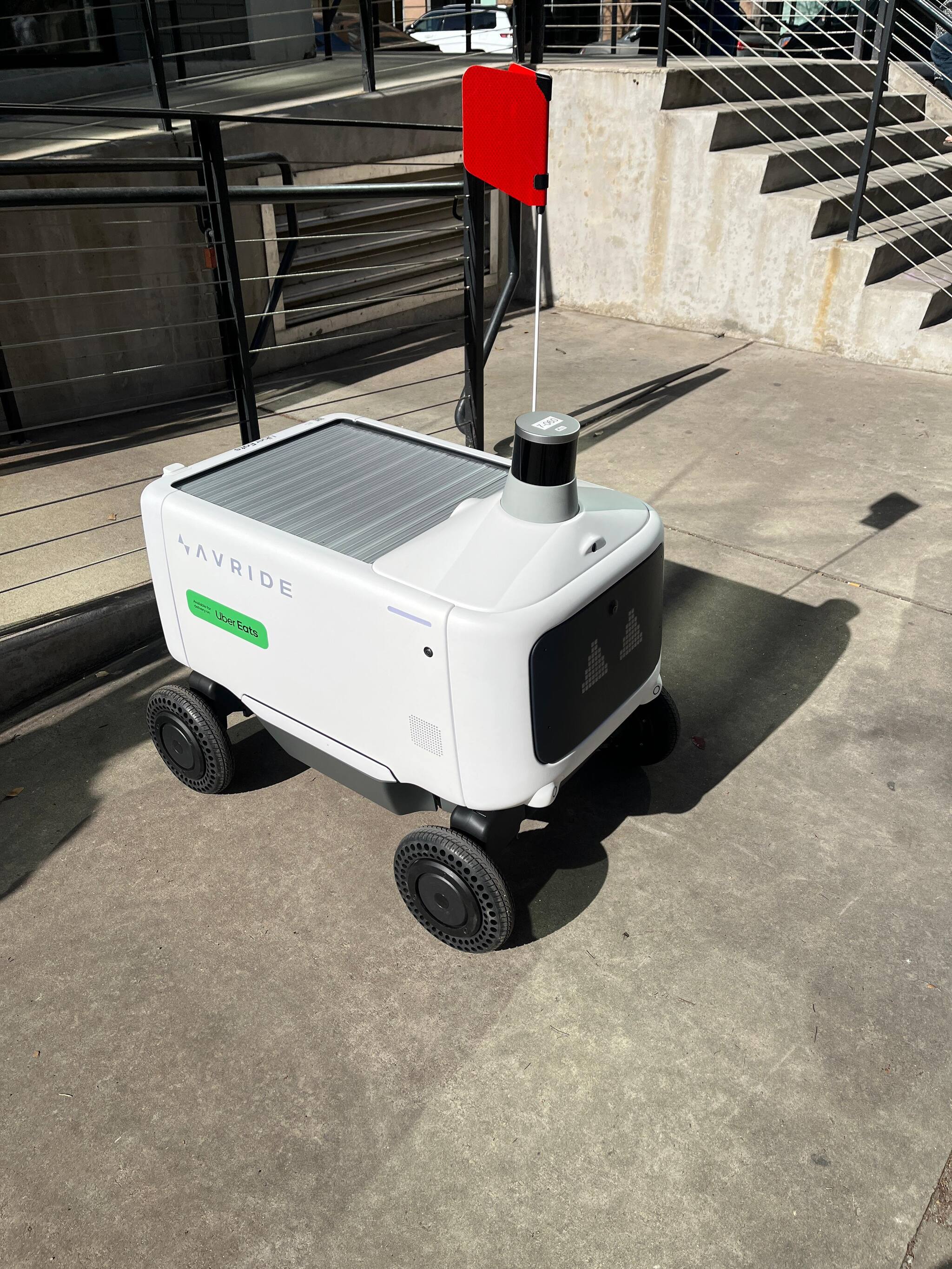 An Avride robot preparing to deliver food to an Uber Eats customer in Austin, Texas