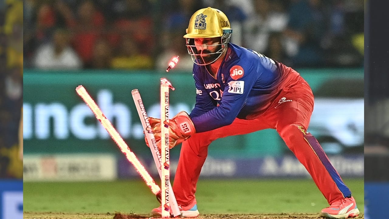 2. Dinesh Karthik – 174 Dismissals Dinesh Karthik’s 174 dismissals (137 catches, 37 stumpings) showcase his agility and longevity across multiple IPL franchises, including Kolkata Knight Riders (KKR) and Royal Challengers Bengaluru (RCB). His ability to handle spin and pace with equal ease has made him one of the most consistent and adaptable wicketkeepers in the league. (Image: AFP)