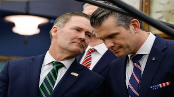 US National Security Advisor Mike Waltz (left) and Defense Secretary Pete Hegseth.
